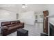 Spacious living room with a fireplace, vaulted ceiling, and open layout at 7835 Teton Trl, Douglasville, GA 30134