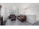 Bright living room features a vaulted ceiling, fireplace and a bay window at 7835 Teton Trl, Douglasville, GA 30134