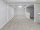 This finished basement features neutral walls, recessed lighting, and plush carpet at 10 Mariner Se Way, Acworth, GA 30102