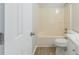 A full bathroom features a shower over the bath at 10 Mariner Se Way, Acworth, GA 30102