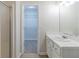 Bathroom featuring a walk-in closet and sink at 10 Mariner Se Way, Acworth, GA 30102