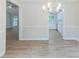 Bright dining room featuring a large bay window and modern light fixture at 10 Mariner Se Way, Acworth, GA 30102