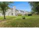 Well-maintained backyard with green lawn and beautiful landscaping providing a serene outdoor space at 122 Susobell Pl, Woodstock, GA 30188