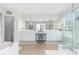 Bathroom features a glass shower, a soaking tub, double sinks and an expansive vanity area at 122 Susobell Pl, Woodstock, GA 30188