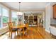 Bright breakfast nook with a wooden table, surrounded by windows, offering a cozy space for meals and natural light at 2850 Seagrave Way, Marietta, GA 30066