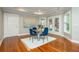 Bright dining area with hardwood floors, elegant lighting, and access to the outdoor space at 2850 Seagrave Way, Marietta, GA 30066
