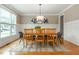 Bright dining room with a wood table, decorative art, and natural light at 2850 Seagrave Way, Marietta, GA 30066