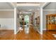Bright foyer showcasing hardwood floors leading to the living room and staircase at 2850 Seagrave Way, Marietta, GA 30066