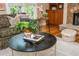 A cozy living room showcases hardwood floors, a patterned sofa, a round coffee table, and decorative accessories at 2850 Seagrave Way, Marietta, GA 30066