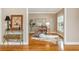 Bright office with hardwood floors, neutral walls, white trim, and contemporary decor seen from an open doorway at 2850 Seagrave Way, Marietta, GA 30066