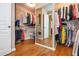 Spacious walk-in closet with ample storage and built-in shelving at 2850 Seagrave Way, Marietta, GA 30066
