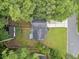 An overhead view of a charming two-story home with a well-manicured lawn at 3232 Valley View St, Powder Springs, GA 30127