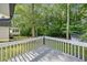 A beautiful view of the lush backyard with mature trees and a well-maintained lawn at 3232 Valley View St, Powder Springs, GA 30127