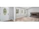 Open concept living room featuring durable flooring and a cozy fireplace at 3232 Valley View St, Powder Springs, GA 30127
