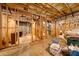 Spacious unfinished basement with visible framework and concrete walls, awaiting personalization at 390 Glengarry Chase, Covington, GA 30014