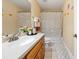 Cozy bathroom with a single sink, vanity, and shower/tub combo, perfect for guests at 390 Glengarry Chase, Covington, GA 30014