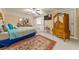 Large bedroom featuring multiple dressers, a ceiling fan, and carpeted floors, with lots of natural light at 390 Glengarry Chase, Covington, GA 30014