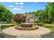 Community Center fountain with manicured landscaping and pristine walkways at 390 Glengarry Chase, Covington, GA 30014