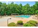 A clean community pool with plenty of lounge chairs for residents to relax at 390 Glengarry Chase, Covington, GA 30014