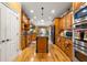 Spacious kitchen features custom cabinetry and an island at 390 Glengarry Chase, Covington, GA 30014