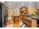 Well-equipped kitchen with wooden cabinetry and stainless steel appliances at 390 Glengarry Chase, Covington, GA 30014