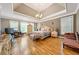 Spacious main bedroom with hardwood floors, recessed lighting, and decorative ceilings at 390 Glengarry Chase, Covington, GA 30014