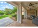 Inviting covered patio with comfortable seating, perfect for outdoor relaxation at 390 Glengarry Chase, Covington, GA 30014
