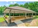 Community pavilion with multiple ceiling fans and stone support pillars is perfect for gatherings at 390 Glengarry Chase, Covington, GA 30014