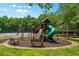 A fun community playground surrounded by lush greenery for to enjoy at 390 Glengarry Chase, Covington, GA 30014