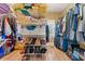 Organized walk-in closet with shelves and racks, providing ample storage for clothes, shoes and linens at 390 Glengarry Chase, Covington, GA 30014