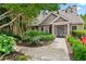 Well-maintained building exterior with lush landscaping and inviting entryway at 3115 Seven Pines Ct # 308, Atlanta, GA 30339