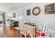Cozy dining area with hardwood floors, white walls, and seating for four, creating an inviting space for meals at 3115 Seven Pines Ct # 308, Atlanta, GA 30339