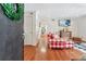View from doorway into the charming living room with hardwood floors and a decorative fireplace at 3115 Seven Pines Ct # 308, Atlanta, GA 30339