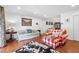 Bright living room featuring neutral walls, hardwood floors, and an open concept design at 3115 Seven Pines Ct # 308, Atlanta, GA 30339