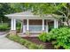 Community mailbox area with stone columns and mature landscaping at 3115 Seven Pines Ct # 308, Atlanta, GA 30339