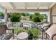 Enjoy the outdoors on this cozy covered patio with serene views of the community at 3115 Seven Pines Ct # 308, Atlanta, GA 30339