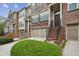 Street view of inviting townhomes featuring brick facades and well-kept landscaping at 346 Ardmore Ct, Atlanta, GA 30309