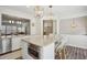 Bright kitchen features an island with seating and stainless steel appliances at 346 Ardmore Ct, Atlanta, GA 30309