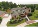 Stunning aerial view showcasing the estate's expansive grounds, lush gardens, and circular driveway at 794 Rutland Ct, Lithonia, GA 30058