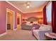 Bedroom with carpet, neutral chair, and an ensuite bathroom at 794 Rutland Ct, Lithonia, GA 30058