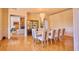 Elegant dining room with chandelier, hardwood floors, and seating for ten is perfect for gatherings at 794 Rutland Ct, Lithonia, GA 30058
