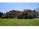 Expansive backyard view featuring an exterior elevation with multiple decks and garage parking at 794 Rutland Ct, Lithonia, GA 30058