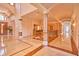 Spacious foyer boasting marble floors, columns, and sophisticated architectural details at 794 Rutland Ct, Lithonia, GA 30058