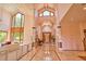 Impressive foyer with soaring ceilings, marble flooring, and detailed woodwork creating a grand and welcoming entrance at 794 Rutland Ct, Lithonia, GA 30058