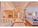 Long hallway with recessed lighting and elegant columns, offering a view to other rooms at 794 Rutland Ct, Lithonia, GA 30058