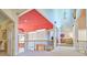Hallway featuring an open design with a red ceiling, second-story vantage point, and natural lighting at 794 Rutland Ct, Lithonia, GA 30058