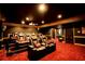 Home theater with plush seating, projector, and ambient lighting, perfect for immersive entertainment experiences at 794 Rutland Ct, Lithonia, GA 30058