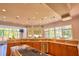 Bright kitchen with large windows, granite countertops, stainless steel appliances, and ample cabinet space at 794 Rutland Ct, Lithonia, GA 30058