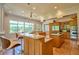 Spacious kitchen with large island, barstool seating, stainless steel appliances, and large windows at 794 Rutland Ct, Lithonia, GA 30058