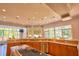 Gourmet eat-in kitchen with bar seating and breakfast nook overlooking the yard at 794 Rutland Ct, Lithonia, GA 30058